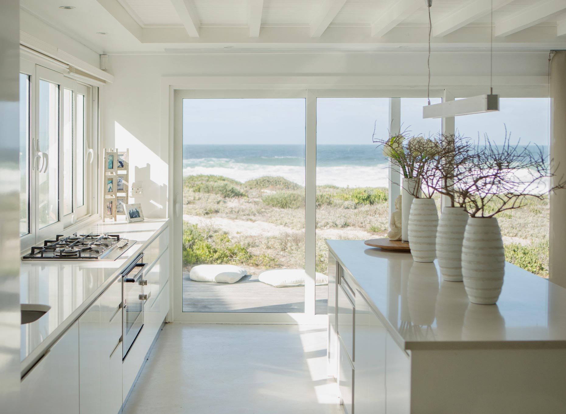 Luxury kitchen with ocean outside the door, Ballard Luxury Homes