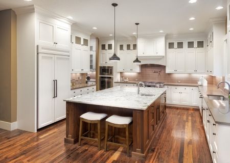 Luxury kitchen with island and hardwood flooring