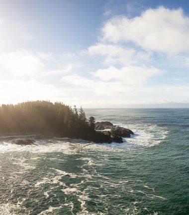 Vancouver Island shoreline, ocean, sun and blue skies
