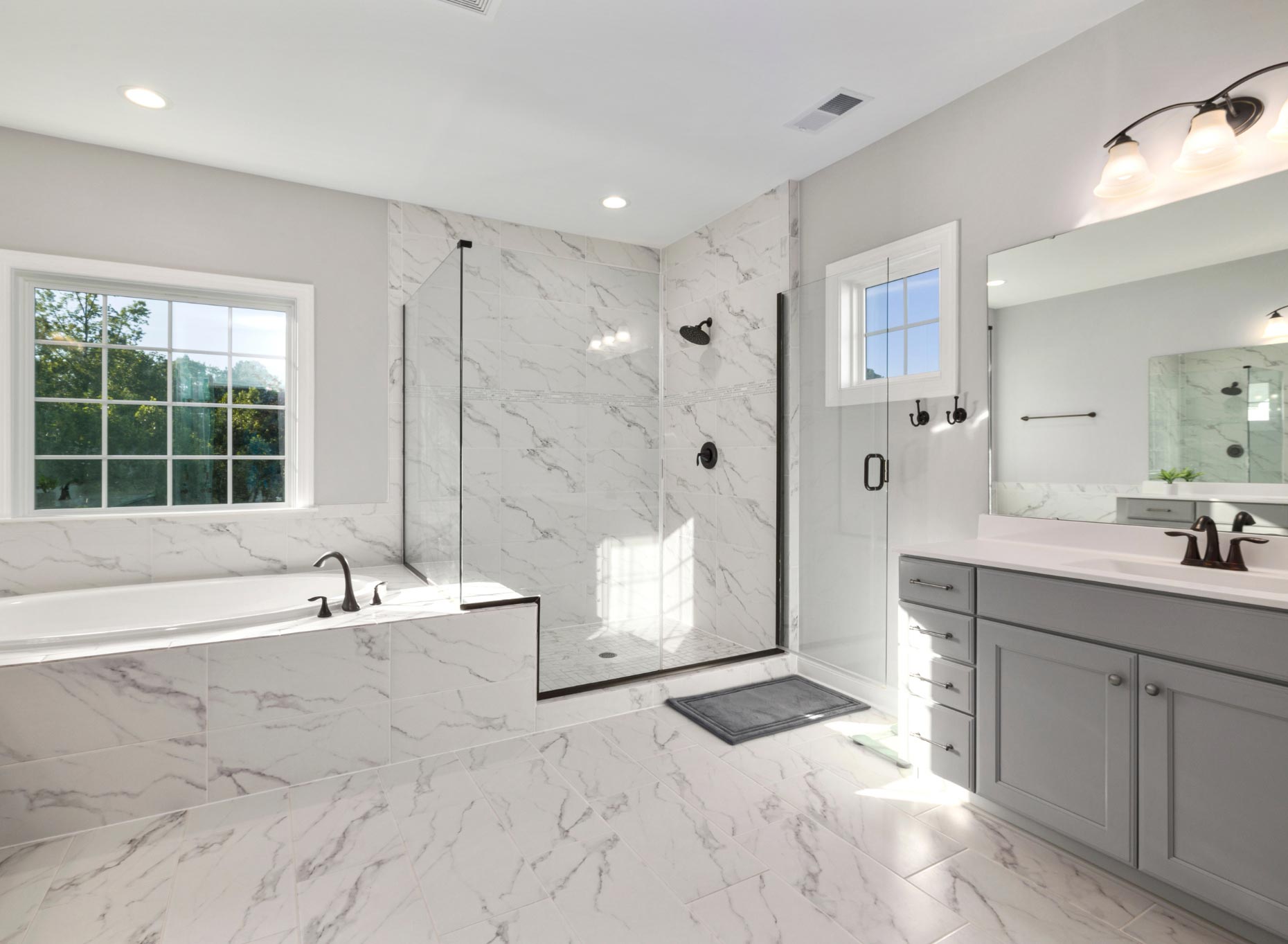 Luxury bathroom, white decor, forest outside the window
