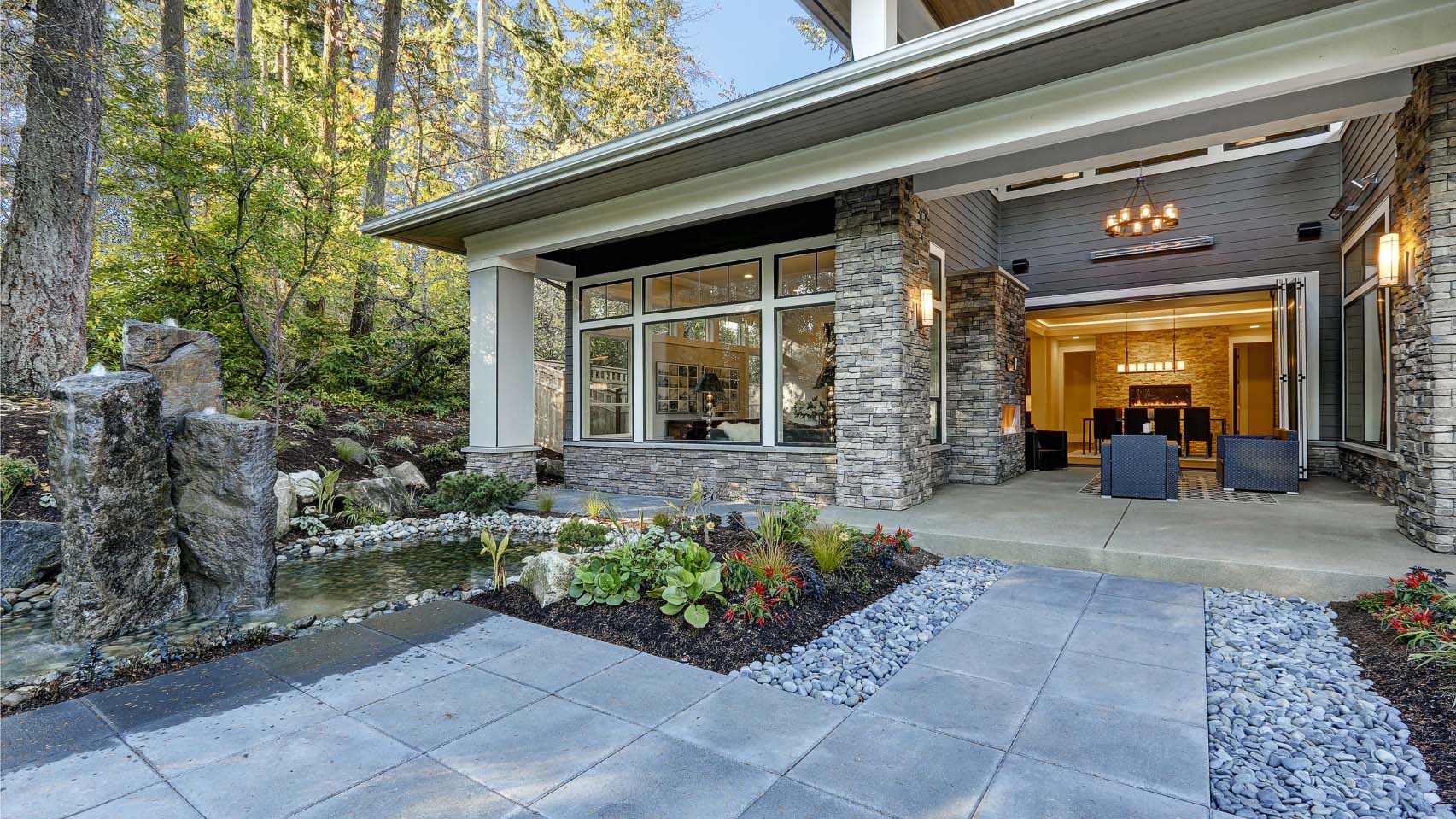 Exterior of luxury home with forest in behind, Ballard Luxury Homes