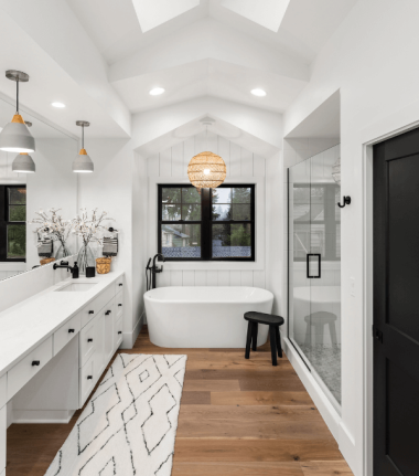Luxury bathroom interior with trees and backyard out of the window, Ballard Luxury Homes